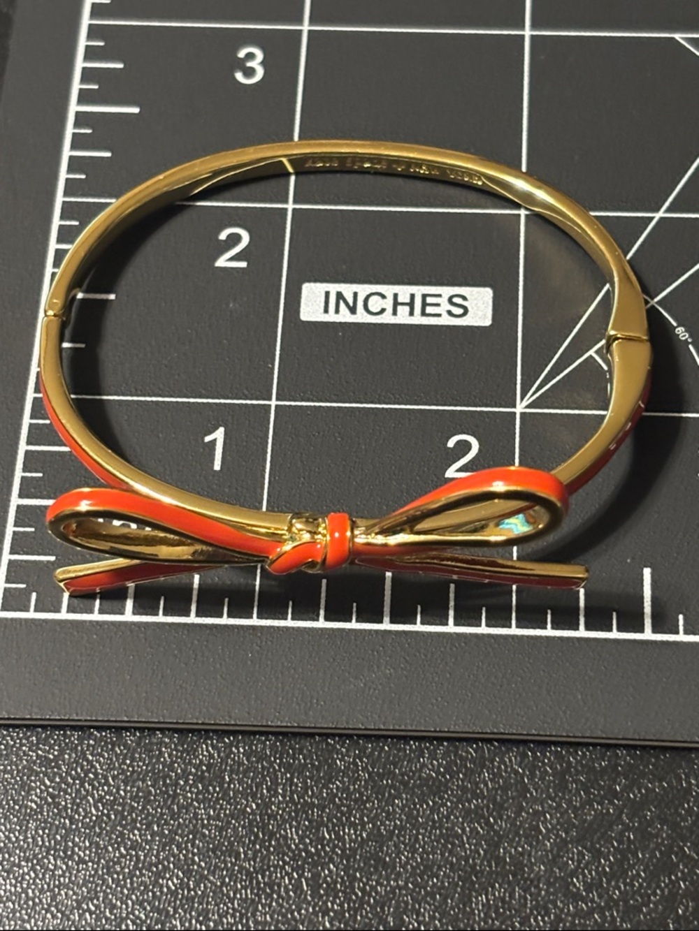Kate Spade New York Skinny Mini Bow Bangle in Orange Enamel‎ - Picture 11 of 12